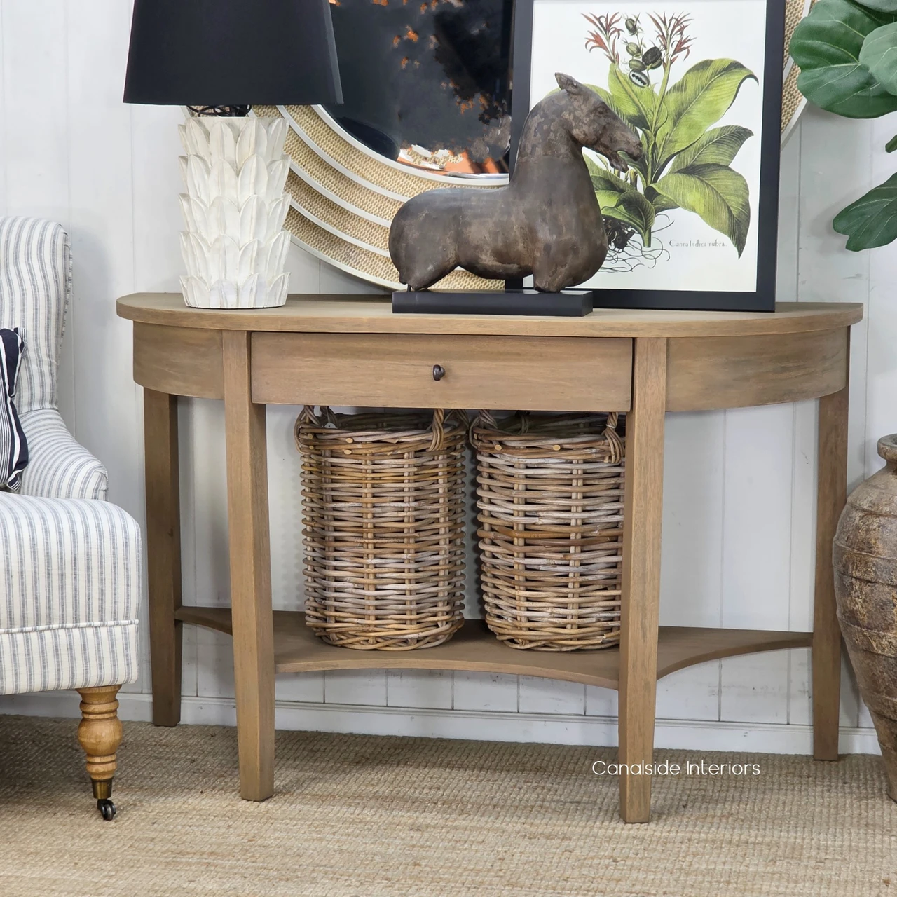 Luna Demilune Console Table with Drawer in natural timber finish, styled in an elegant living room