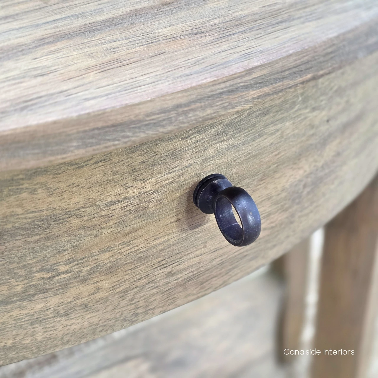 Luna Side Table drawer detail showcasing the central storage drawer and contrasting dark round knob.