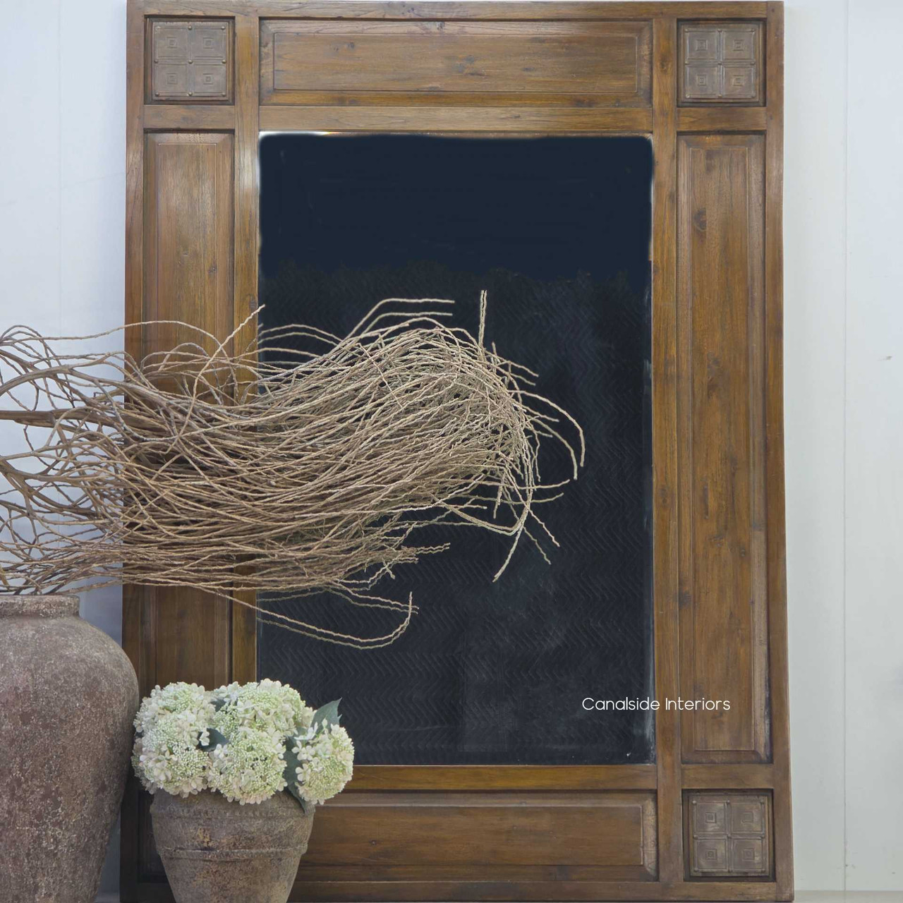 Full front-facing shot highlighting the mirror’s natural timber grain and detailed corner carvings.