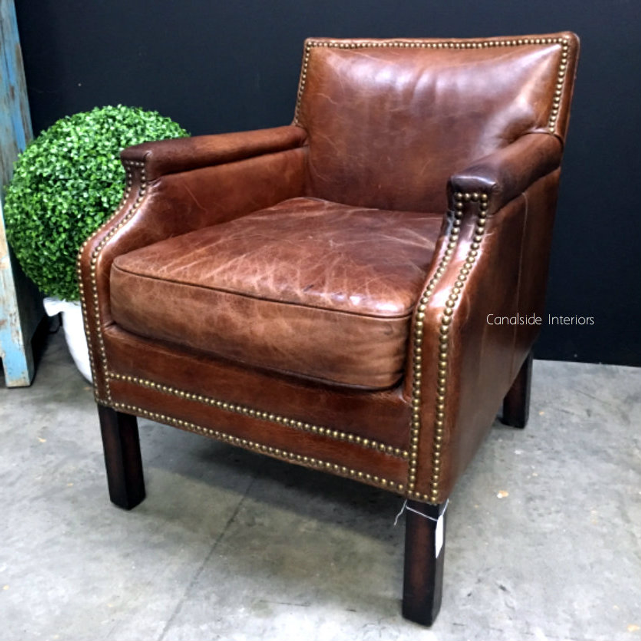 A direct overhead shot of the armchair, offering a unique view of its elegant proportions and design.