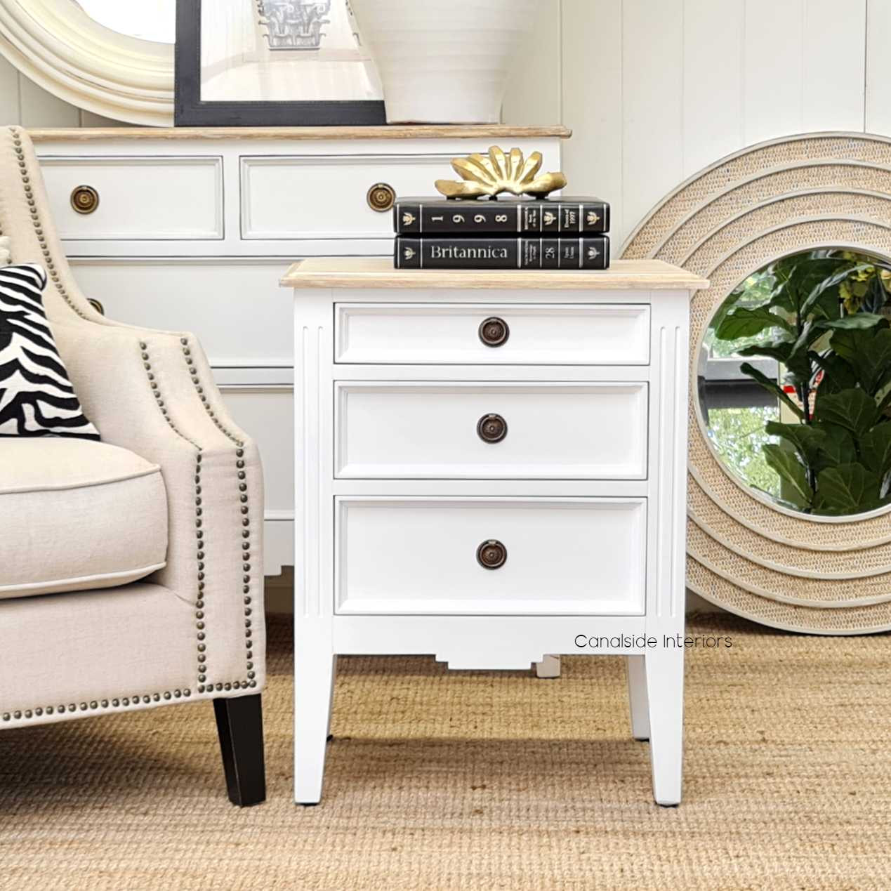 Elegant Peninsula Bedside Table featuring a white finish with a limewash top, perfect for adding coastal charm to any bedroom.