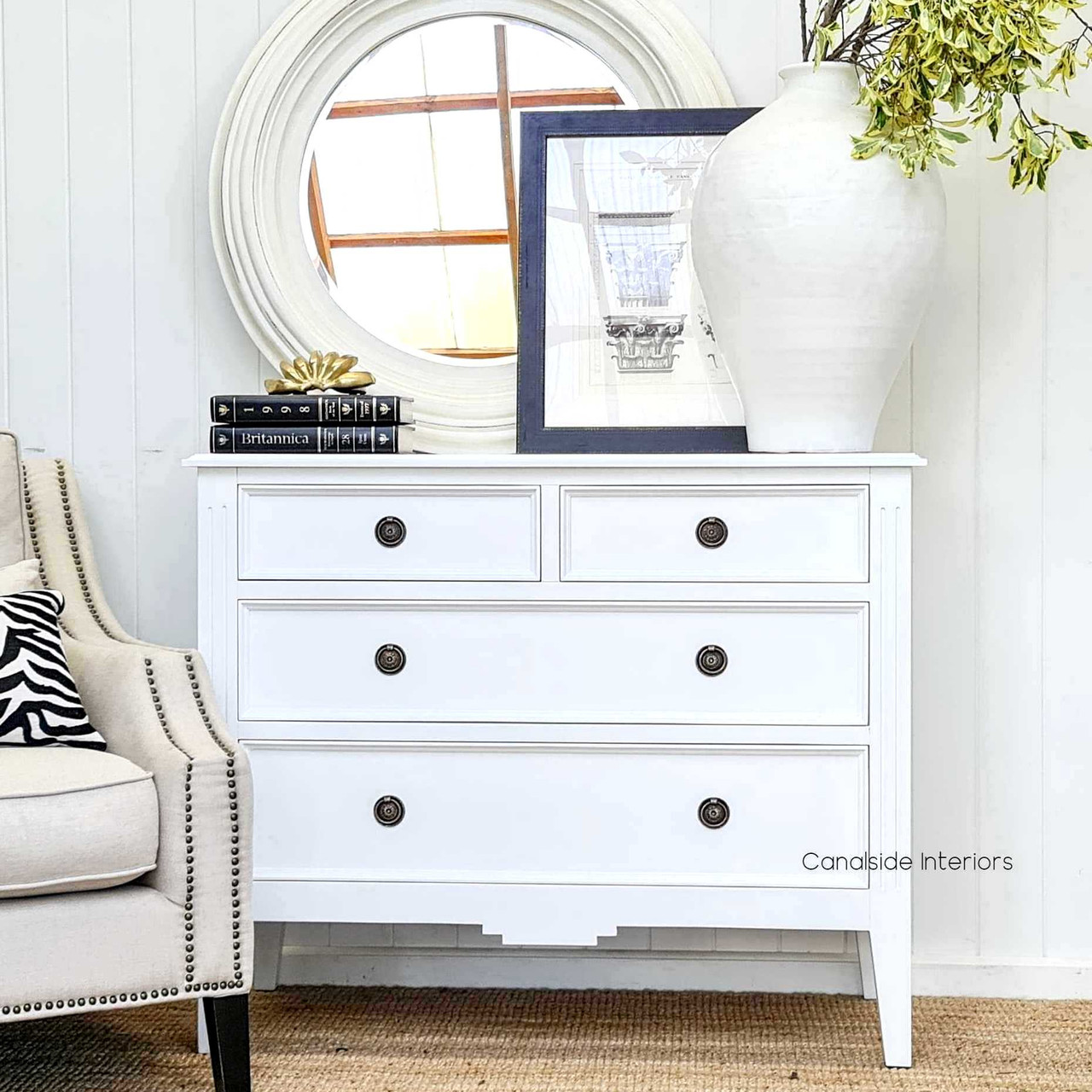 Front view of the Peninsula 4 Drawer Chest in white, embodying understated elegance for sophisticated interiors.