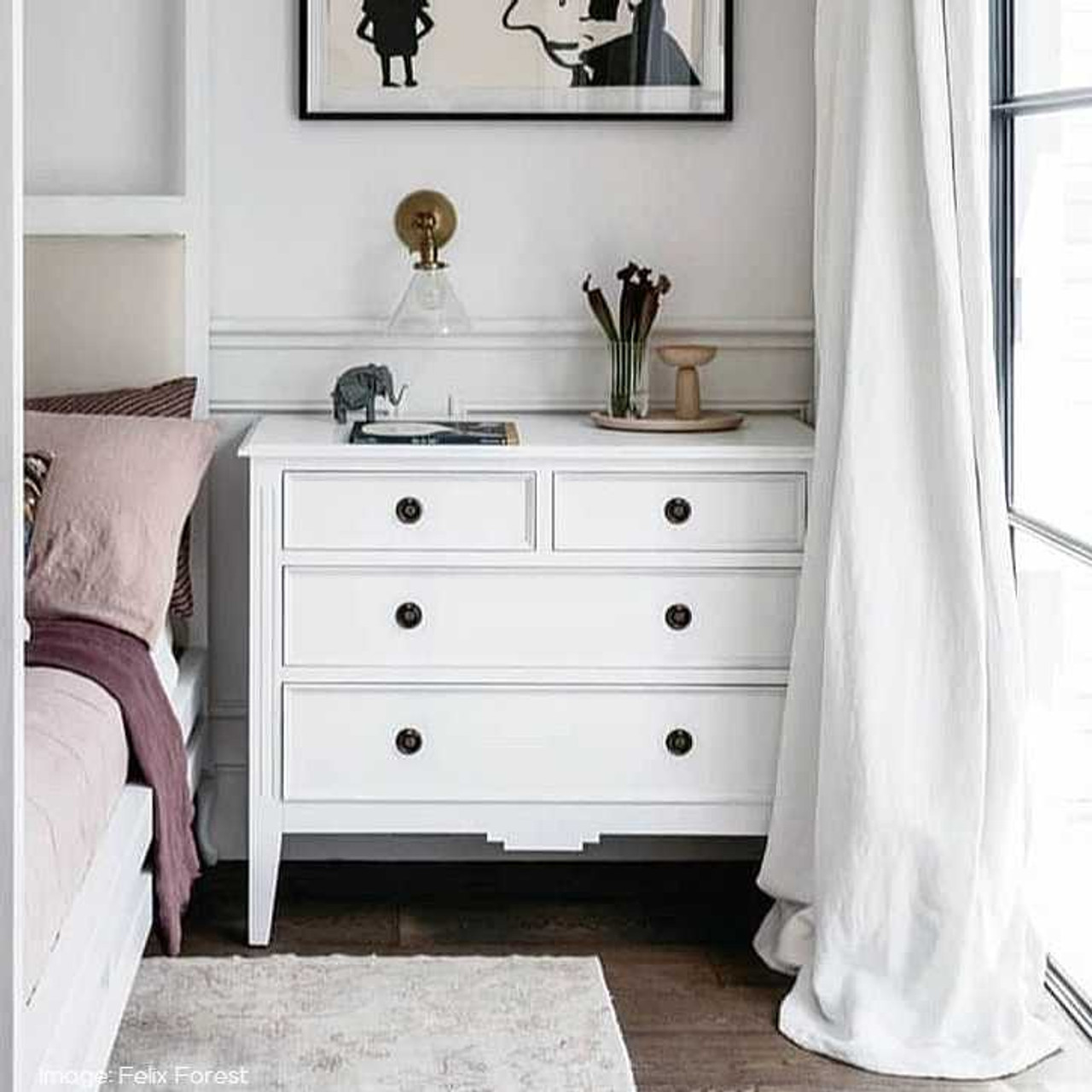 Lifestyle image: The chest arranged in a bedroom, demonstrating its versatility and aesthetic appeal in various decor settings.