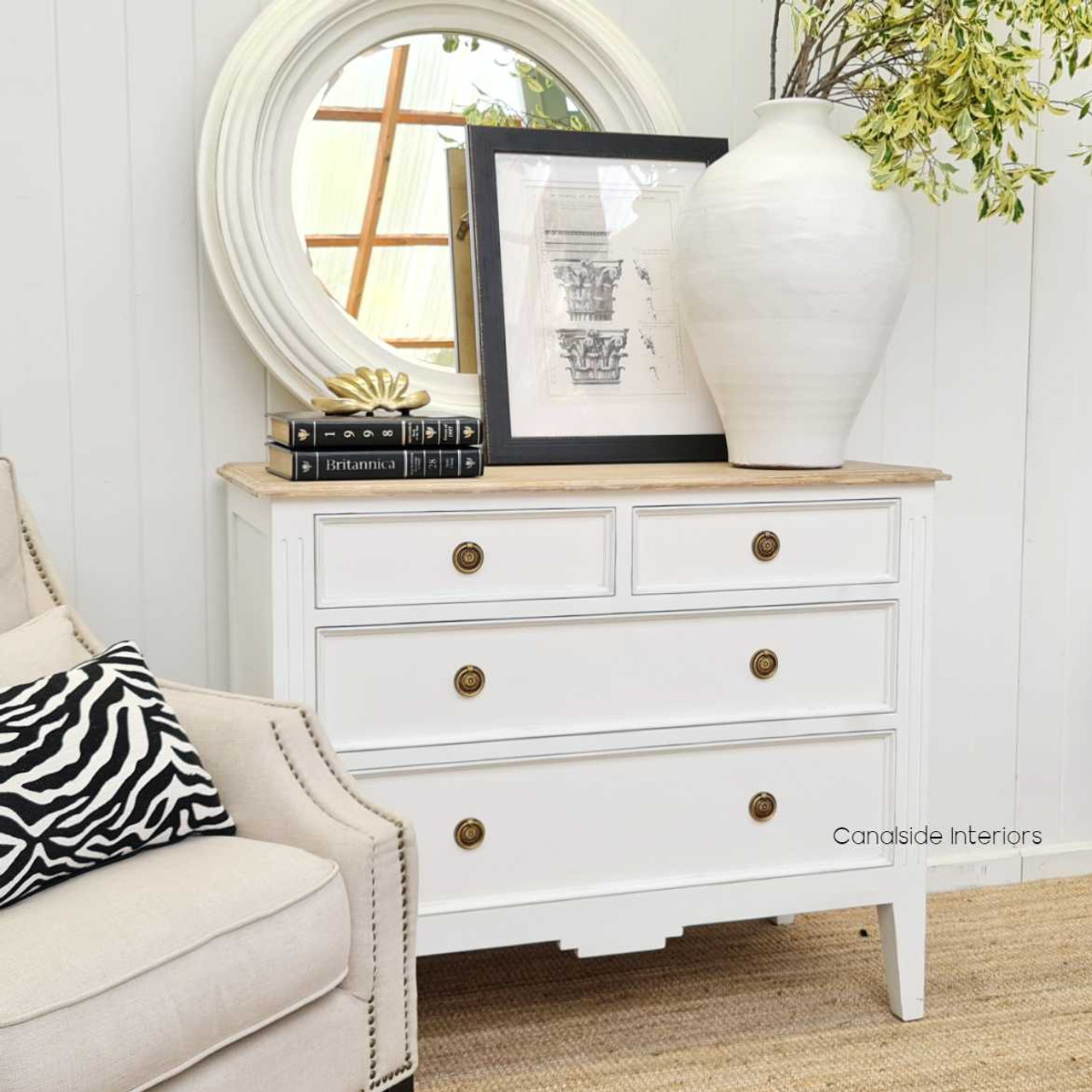 Lifestyle image: The chest arranged in a living room, demonstrating its versatility and aesthetic appeal in various decor settings.