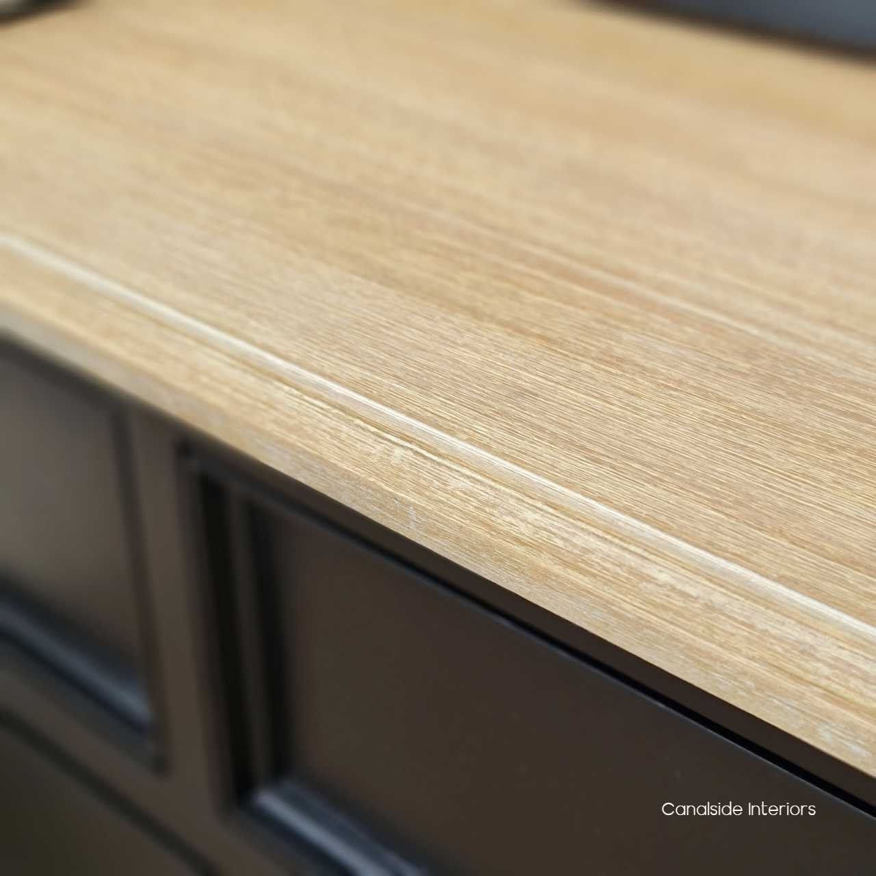 Close-up of the limewash top, highlighting the texture and detailing that adds depth and character to the piece.