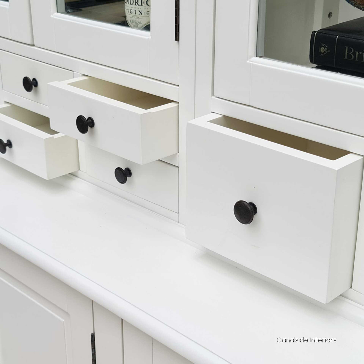With its elegant white finish, the Key Largo Display Unit by Canalside Interiors makes for a perfect, stylish organization in your dining room
