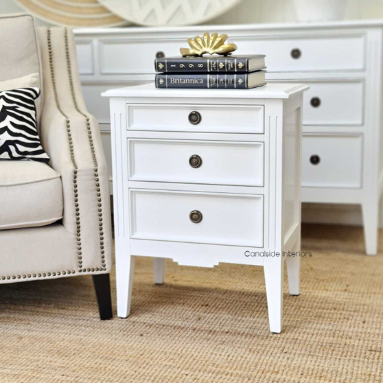 Front view of the Peninsula Bedside Table in distressed white, highlighting its classic elegance and perfect fit for Hamptons-style bedrooms.