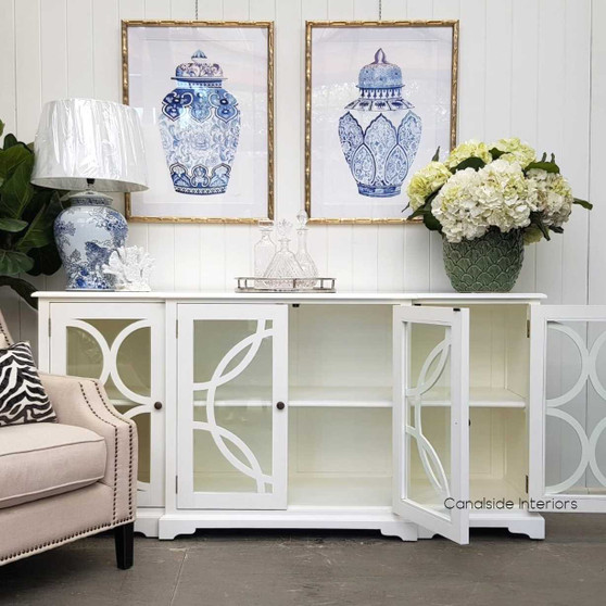 Front view of the Mercia Glass Sideboard in Distressed White, showcasing its elegant circular overlay pattern.