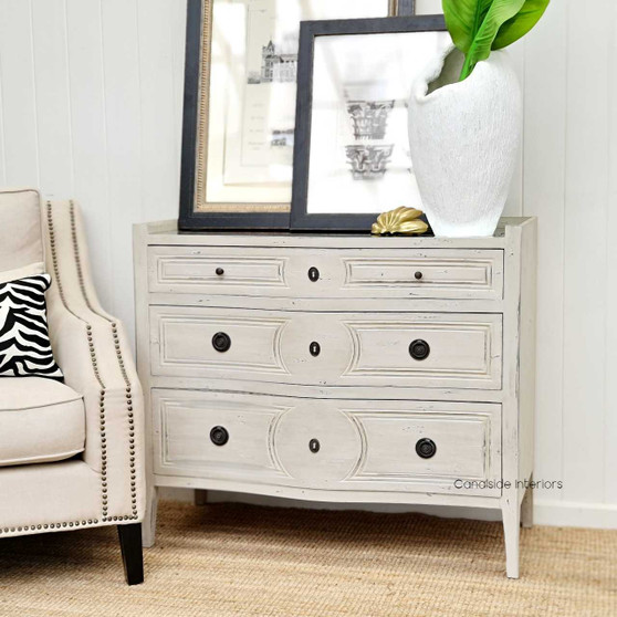 Isobel Chest in distressed grey, merging French tradition with coastal elegance for a modern bedroom