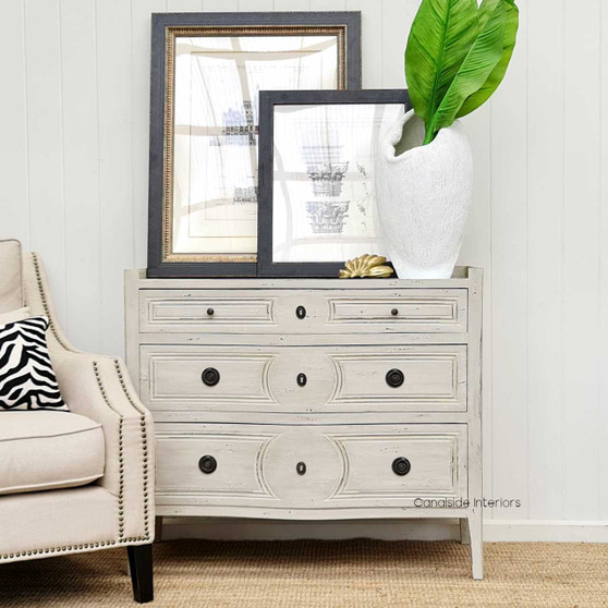 Isobel Chest in distressed grey, merging French tradition with coastal elegance for a modern bedroom