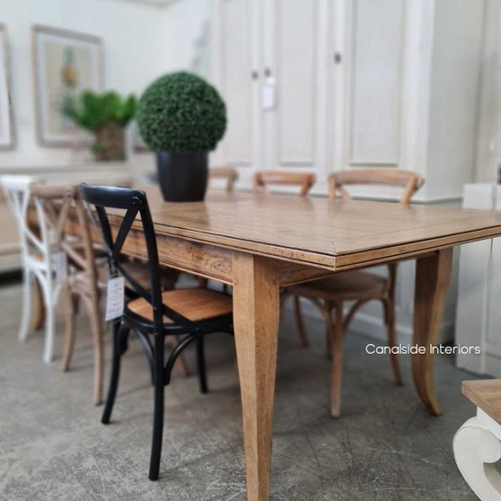 The Lavinia Double Extension Dining Table in natural wood, showcasing handcrafted Queen Anne legs and butterfly fold extensions – a versatile piece by Canalside Interiors for sophisticated dining