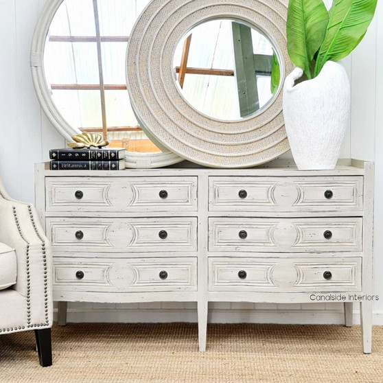 The Isobel Grande Chest in distressed grey, perfectly capturing the Hamptons style for a luxurious bedroom – Canalside Interiors.