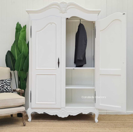 Handcrafted with precision, the elegant James Armoire features a modern twist on classical French design for your living room storage needs – Canalside Interiors.