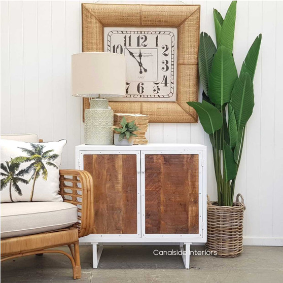 The Ellaria Sideboard in distressed white with mangowood doors, a coastal and Hamptons-inspired storage solution for Sydney living rooms - Canalside Interiors.