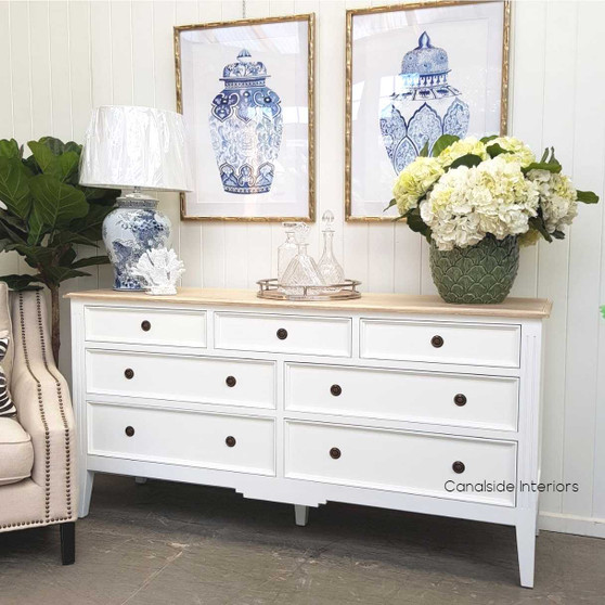 Elegant frontal view of the Peninsula Range Sideboard, showcasing its white finish and limewash top in a Hamptons-style interior.
