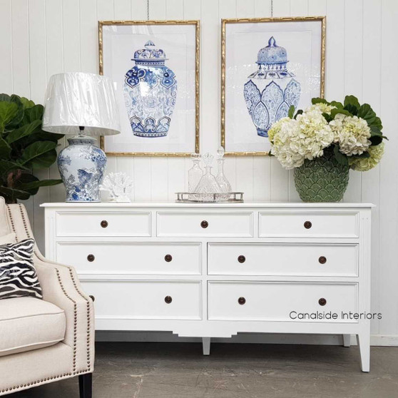 Frontal view of the Peninsula Range Sideboard in white, showcasing its timeless design and minor distressing for a classic look.