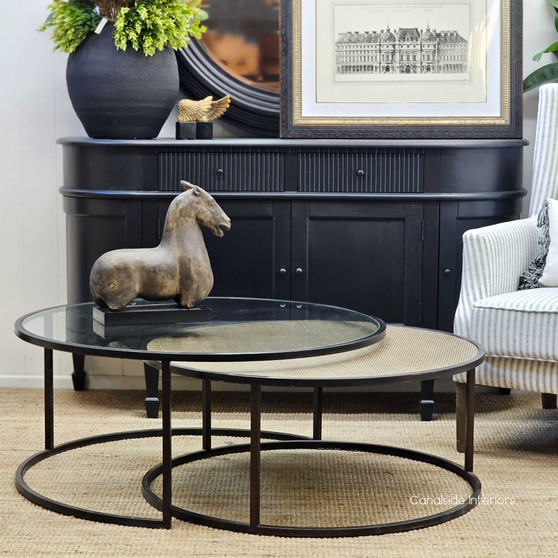The Knox Rattan Nesting Coffee Tables, with their chic tempered glass and natural rattan tops, are a versatile choice for a Hamptons-style living room – Canalside Interiors