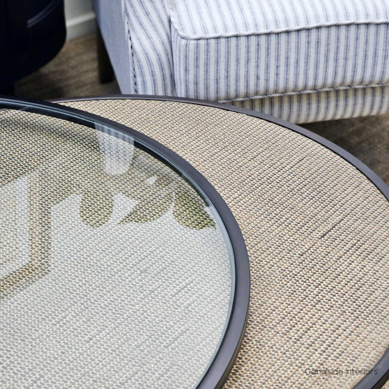 The Knox Rattan Nesting Coffee Tables, with their chic tempered glass and natural rattan tops, are a versatile choice for a Hamptons-style living room – Canalside Interiors