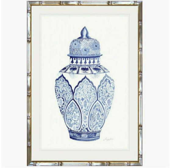 This Chinoiserie urn print by Jennifer Hunt, framed in champagne faux bamboo, is a sophisticated touch for any bedroom seeking Hamptons-style tranquility into your living room with a blue and white Chinoiserie urn print, offering timeless quality and coastal serenity - Canalside Interiors