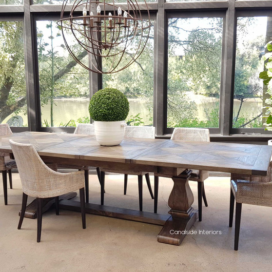Hamptons-inspired Bridgehampton Parquetry Extendable Dining Table with intricate top design in dark cedar, offering timeless elegance for the dining room - Canalside Interiors.