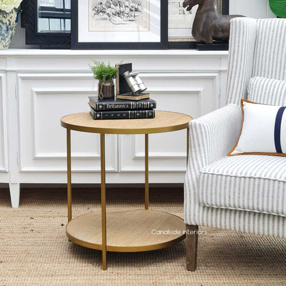 The Knox Rattan Side Table from Canalside Interiors, with its elegant gold frame, brings a modern yet classic flair to your bedroom setting