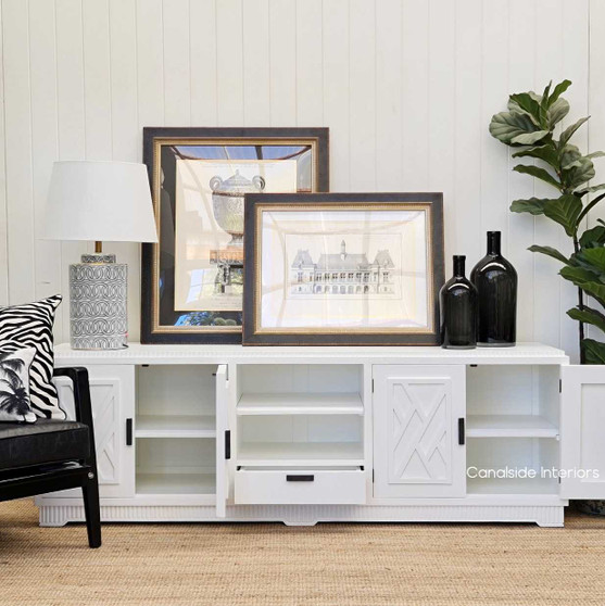 Front view of the white Ellery 4 Door TV Unit with minor distressing, embodying Hollywood Chinoiserie glam for the living room - Canalside Interiors