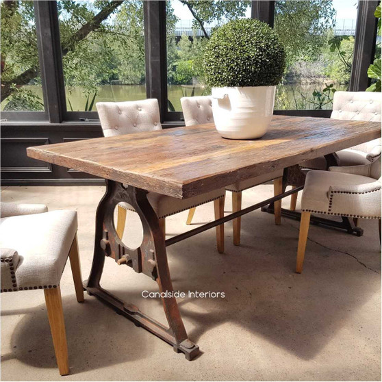 Close-up of the Industrial Reclaimed Wood Tabletop, showcasing the unique wood grain and natural patina that adds character to any room.