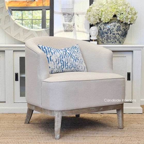 Elegant Hamilton Occasional Tub Armchair with cream upholstery, a Hamptons classic for a sophisticated Sydney living room - Canalside Interiors.