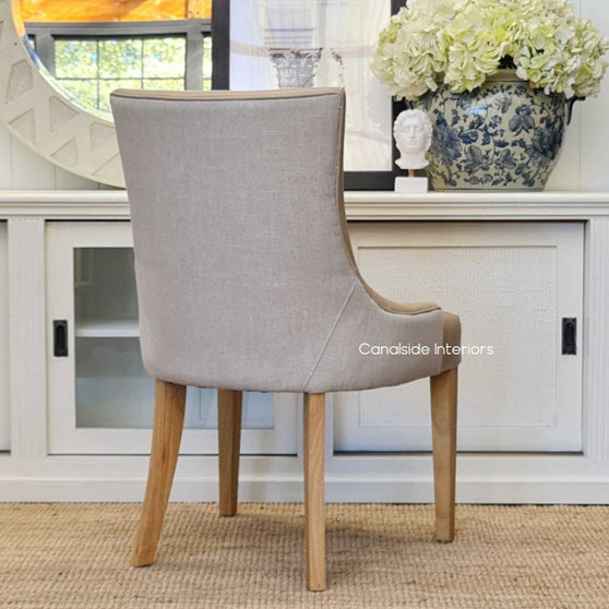 Angled perspective of the Aston Chair, emphasizing the elegant interplay between classic and contemporary design elements.