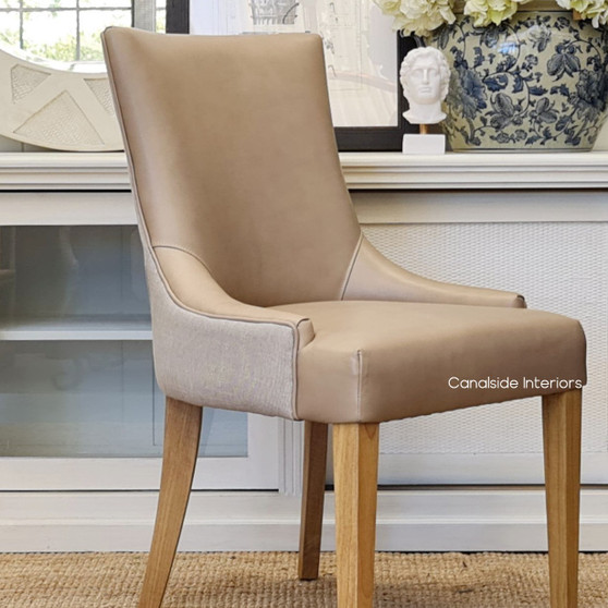 Angled perspective of the Aston Chair, emphasizing the elegant interplay between classic and contemporary design elements.