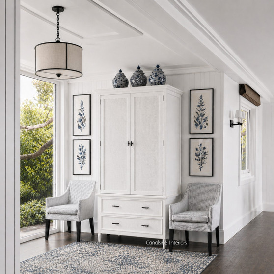 Frontal view of the Brielle Rattan Wardrobe Cupboard in situ in white with door open, showcasing elegant white rattan detailing, storage and sleek design.