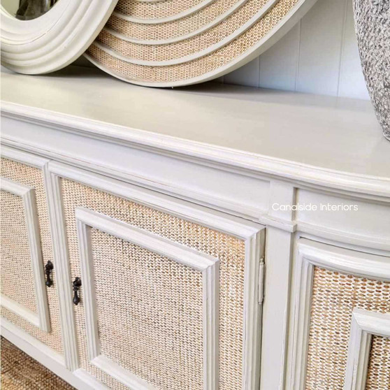 Elevate your living room with the Francia Stone Rattan Sideboard's understated elegance, a nod to Canalside Interiors' expertise in timeless home furnishings