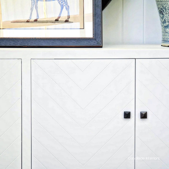 The St Lucia Sideboard in distressed white with a herringbone pattern elevates your living space with its plantation-inspired elegance - Canalside Interiors