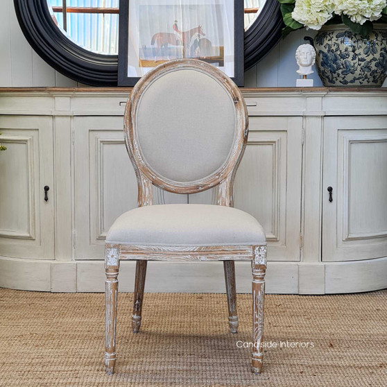 Limewash Sansa Dining Chair with cream upholstery, enhancing the classical charm of a Hamptons dining room - Canalside Interiors