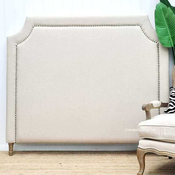 Front view of the Mayfair Hamptons Cream Headboard, showcasing its elegant cream linen upholstery and brass stud detailing.