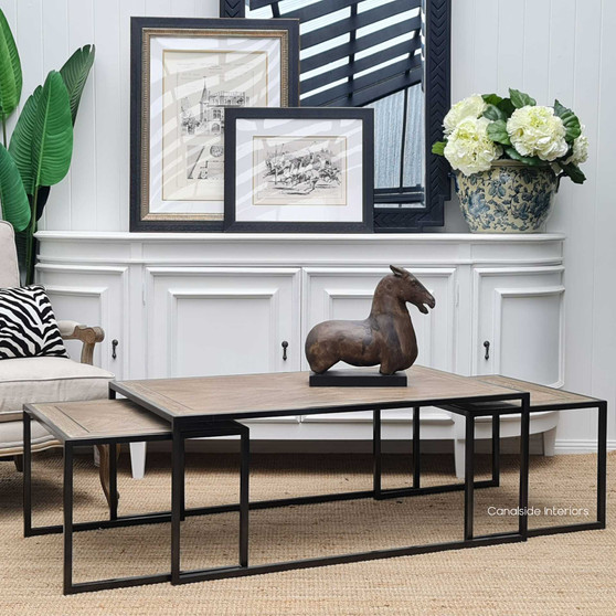 Main view of the Brienne Herringbone Nesting Coffee Table in distressed weathered oak, showcasing its modern and versatile design.