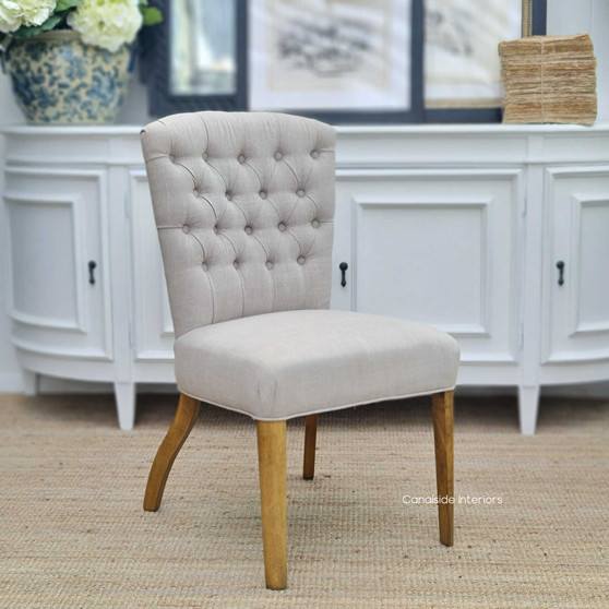 Crafted for longevity and style, the natural-legged Chelsea Dining Chair brings quality craftsmanship to your home's dining space - Canalside Interiors.