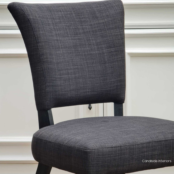 Mimi Upholstered Dining Chair, Timeless Sophistication in Black Linen Blend Upholstery, Black Oak Legs, Brass Stud Detail, Front Angled View