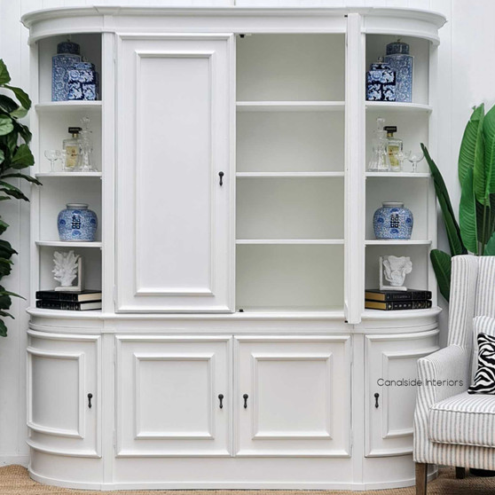 Frontal view of the Francia Curved Wall Unit in distressed white, embodying a blend of classic and modern design