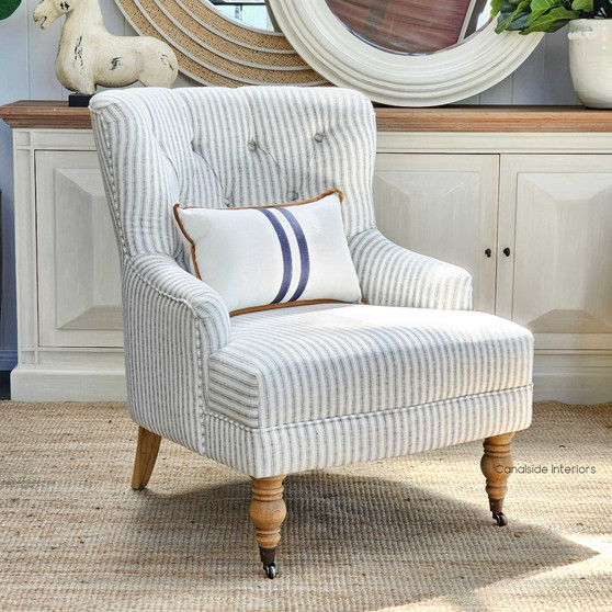 Frontal view of the Ascott Armchair, with its tufted back and comfortable seating, ready to enhance any living space with Canalside Interiors' signature style.