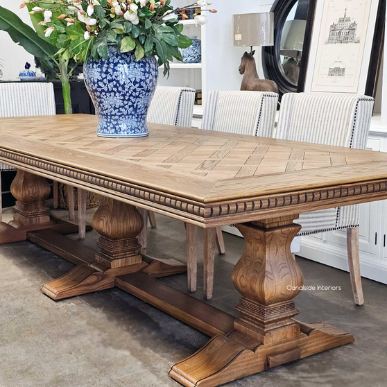 Angled perspective highlighting the table's ability to fit seamlessly into modern settings, at Canalside Interiors.