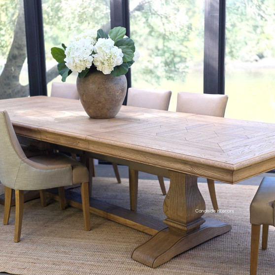 Chesterton Oak Parquetry Double Extension Dining Table fully extended for a grand dinner setting.