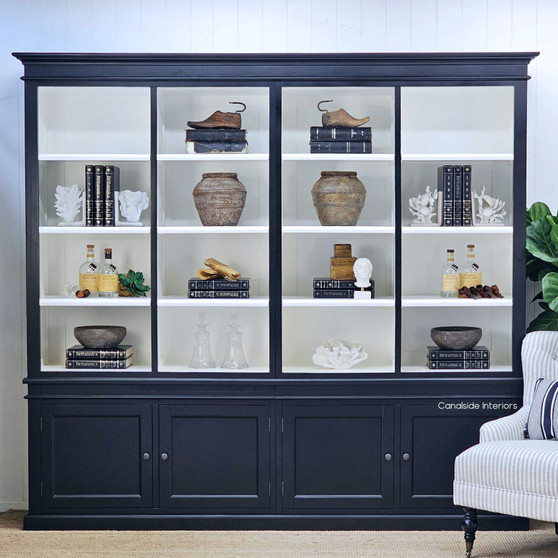 Front-facing image of the Grange 4 Bay Wall Unit in satin black with crisp white interior shelving.