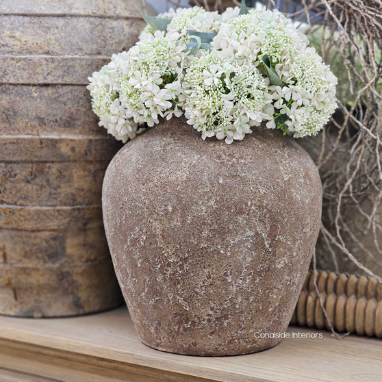 Front view of the Ayara Vessel – Small, highlighting its compact size and deeply textured terracotta surface.