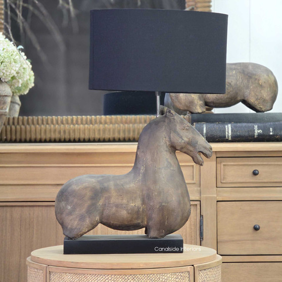 Ancient Equestrian Single Lamp in rustic concrete with black shade on side table
