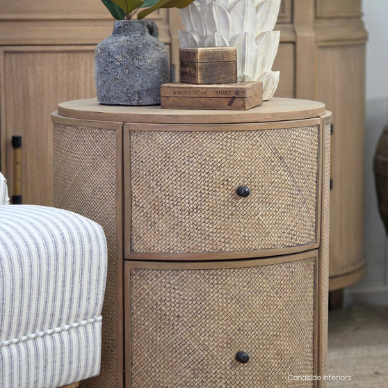 Front view of the Langston Rattan Side Table displaying the smooth surface and organic textures.