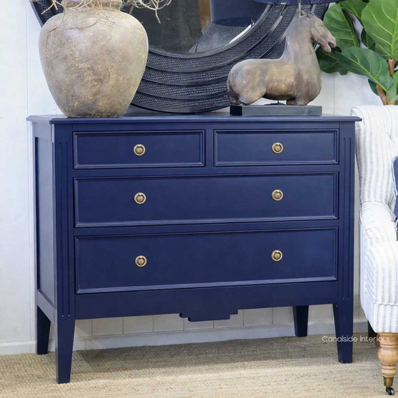 Angled view emphasising the Peninsula chest's straight lines and navy finish, perfect for adding a touch of classical elegance.