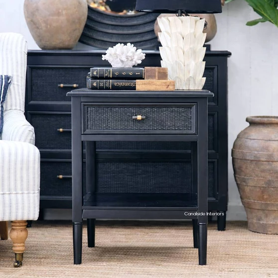 Angled view of the Brielle Rattan 1 Drawer Bedside – Black showing the tapered legs, clean joinery and refined proportions in a Hamptons style interior