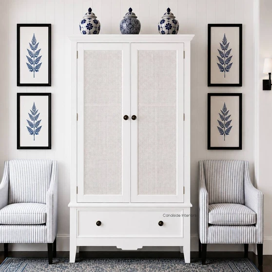 Peninsula Rattan Wardrobe in white styled in a bright Hamptons style bedroom with coastal textures and relaxed neutral décor