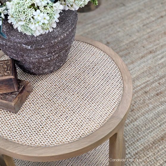Lexington Round Rattan Side Table in Weathered Oak featuring a woven rattan tabletop and matching lower shelf.
